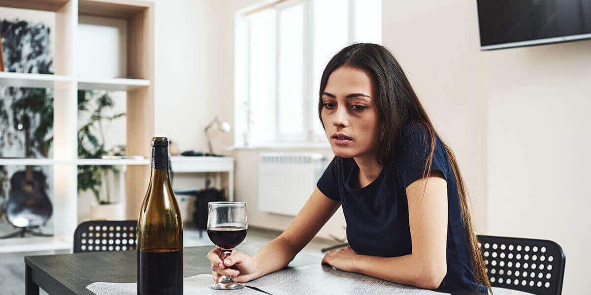 woman showing signs of alcoholism