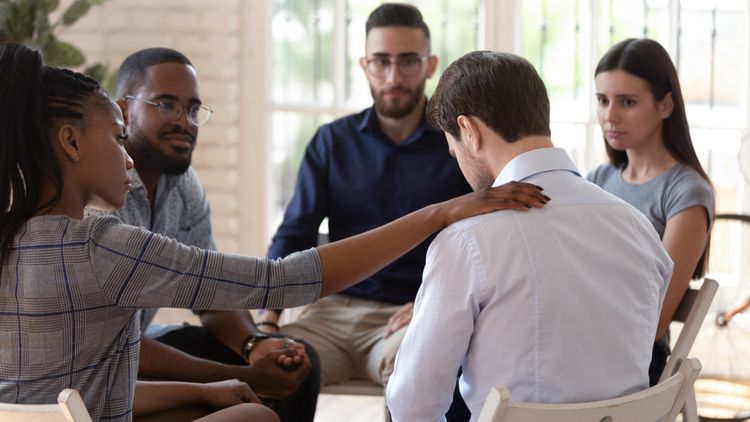 group addiction treatment meeting